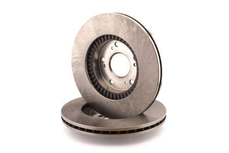 A pair of car brake disc isolated on white background. Auto spare parts - brake disc rotorの写真素材