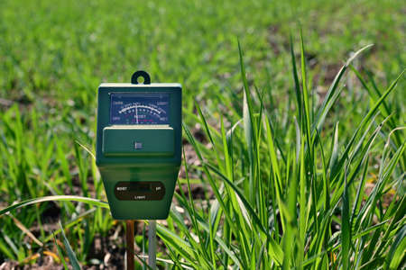 Measure soil moisture, PH and sunlight amount for plants, flowers, vegetable gardens and lawnsの写真素材