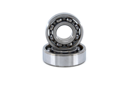 Close-up of tapered roller bearings or ball bearings isolated on white backgroundの写真素材