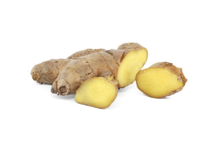 Fresh ginger root with slices isolated on white backgroundの写真素材