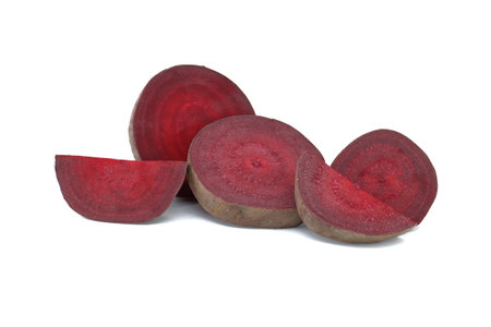Slices of fresh beetroot isolated on white backgroundの写真素材