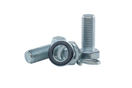 Full thread hexagon bolt and internal screw, flat nut washer and spring washer coated with a protective layer of zinc isolated on white backgroundの写真素材