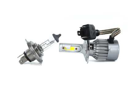 Car H4 LED and halogen headlight bulbs isolated on white backgroundの写真素材