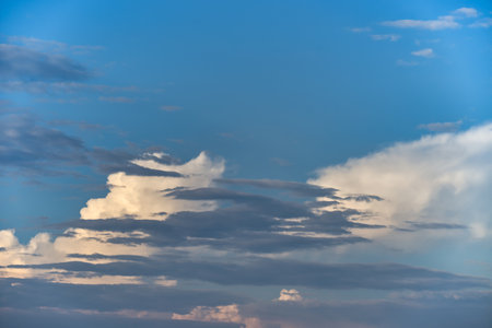 Captivating image of the expansive sky painted with a broad spectrum of blue shades, eliciting feelings of tranquility and opennessの写真素材