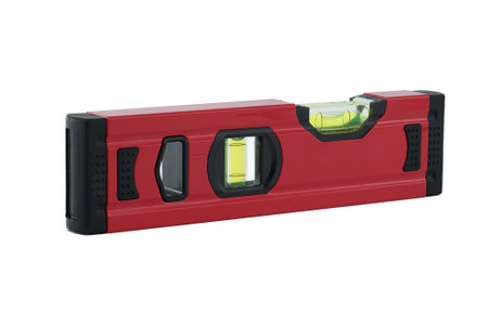 Red spirit level with a green bubble indicator is situated horizontally on a white background