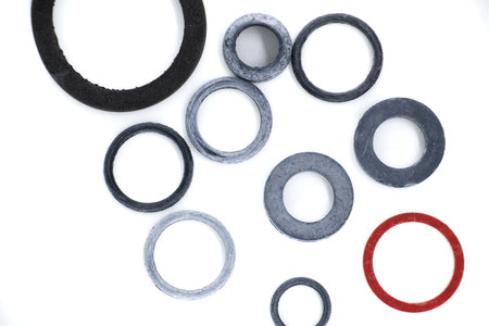 A collection of various rubber and gasket rings, showcasing different sizes and materials, with a...