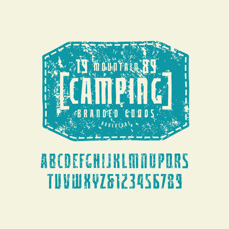 Narrow sans serif font in the style of handmade graphics. Letters with rough texture. Leather patch with camping emblem. Blue print on light backgroundのイラスト素材