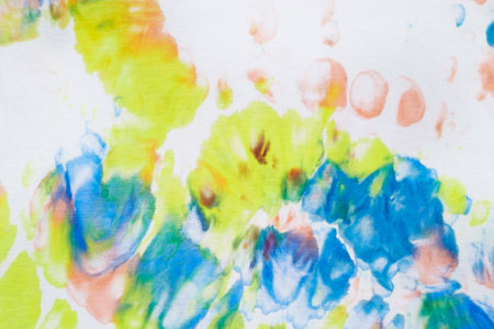 Bright colors abstract hand painted tie dye texture. folk style design. Creative background for textile, fabric, wallpaper, wrapping paperの写真素材