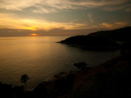 Sunset at Laem Phrom Thep in Phuket, Thailand の写真素材