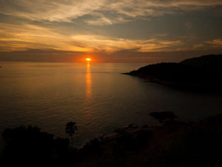 Sunset at Laem Phrom Thep in Phuket, Thailand の写真素材