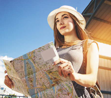 Adventure time in the city of young beautiful tourist woman.