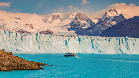 View of glacier Perito Moreno in Patagonia and touristic boat, South America, Autumnの写真素材