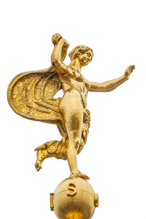 Top figure of ancient Greek goddess Fortuna at Fortunaportal in Potsdam, isolated at white background, Germanyの写真素材