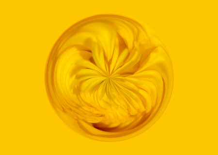 abstract yellow background with a flower in the center of the imageの写真素材