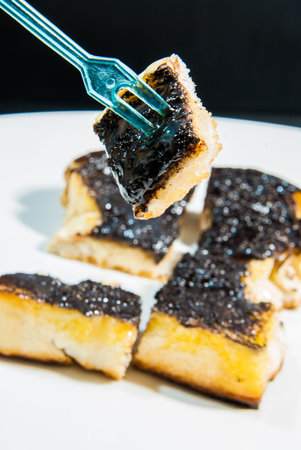 sugar and butter toast against backgroundの写真素材