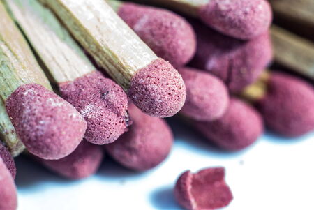 Close-up of a red matches isolated on a white backgroundの写真素材