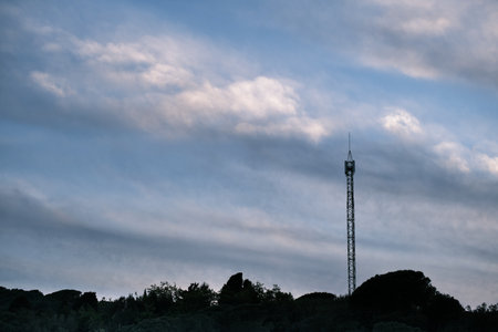 Dark electric tower and skyの写真素材