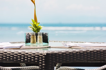 Restaurant table on the beach. Close up viewの写真素材