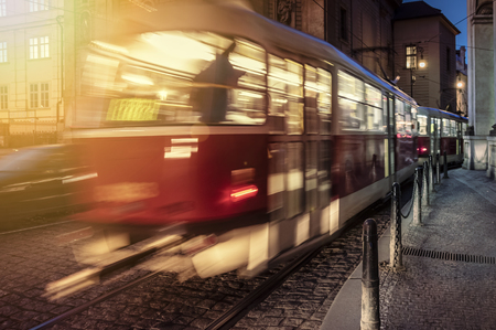 Moving tram at night at Pragueの写真素材