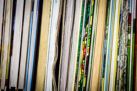 Books without cover end up on shelfの写真素材