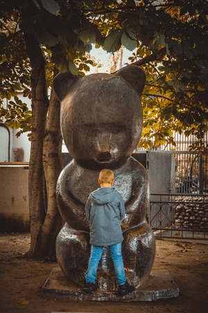 The boy whispers the most intimate statueのeditorial素材
