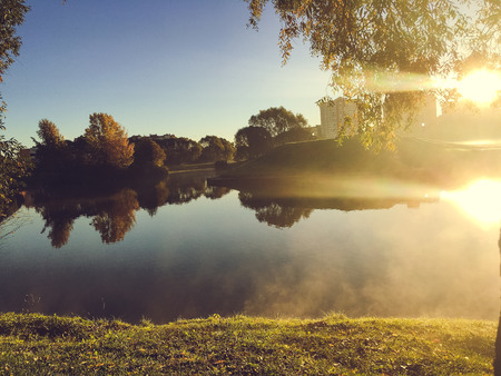 Dawn in the autumn park of St. Petersburg Russiaの写真素材
