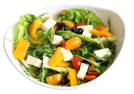 vegetable salad in bowl isolatedの写真素材