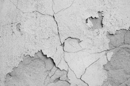 cracked paint on building facadeの写真素材