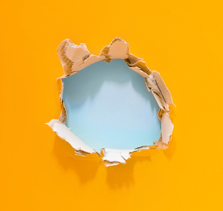 hole in the paperの写真素材
