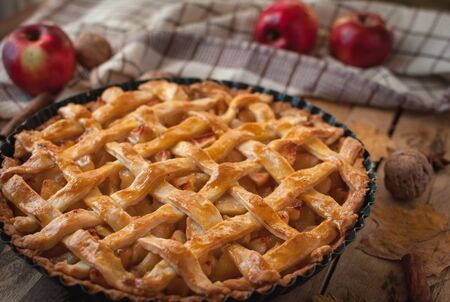Close-up of homemade apple pie on wooden backgroundの写真素材