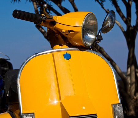 yellow italian retro designed vespa の写真素材
