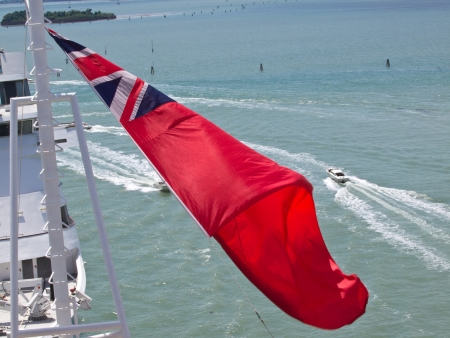 red flag on the cruise shipの写真素材