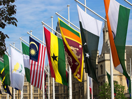 different state flags infront of  House of parliament in London UKの写真素材