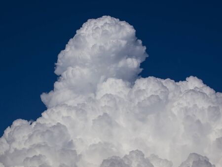 big white fat cloud on the skyの写真素材