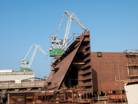 big old cranes in the shipyardの写真素材