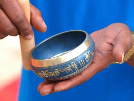 singing bowl in the hands of prayer       の写真素材