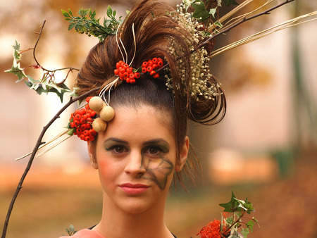 OSIJEK - NOVEMBER 8: Costumed girls participant at the autumn Fantasy Fair in city park november 8 , 2014 in Osijek, Croatiaのeditorial素材
