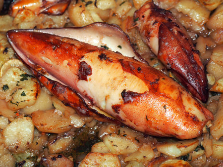 Fried squid stuffed with ham cheese and tentacles