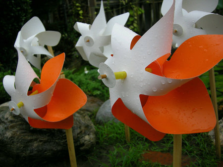 Paper windmills planted in the garden