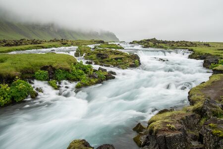 Scenic glacier river in icelandic landscapeの写真素材