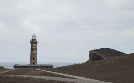 Old lightouse on volcanic faial island on Azoresの写真素材