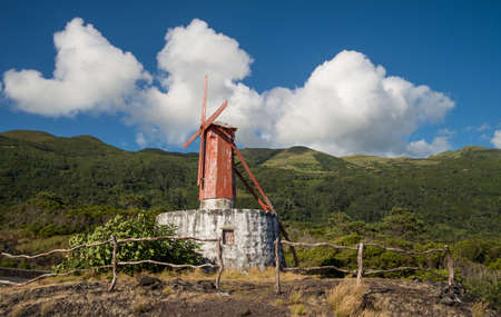 Traditional stone windmill on portuguese Azores islandの写真素材