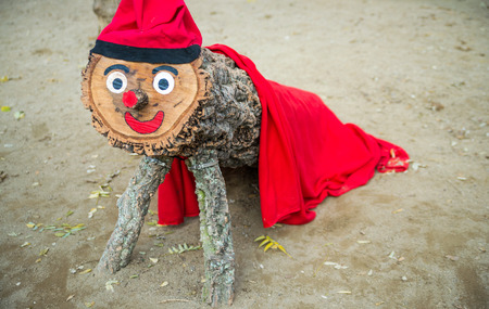 Red navidad woden mascot in Barcelonaの写真素材