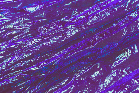 Holographic abstract neon textured background. Retro wave neon colors.の写真素材
