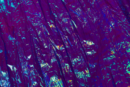 Holographic abstract neon textured background. Retro wave neon colors.の写真素材