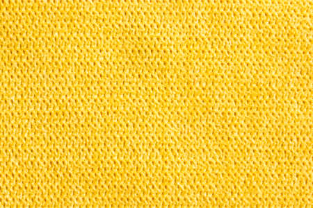 Yellow abstract fabric texture background. Copyspace for text.の写真素材