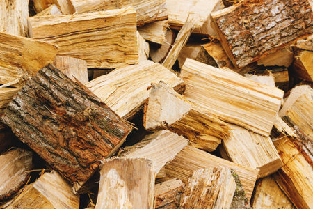 Abstract background from a heap of cut firewood. Selective focus.の写真素材