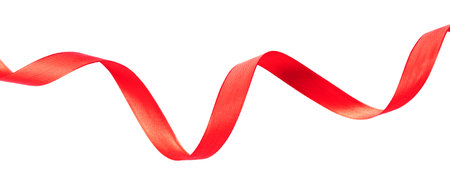 Delicate red wavy ribbon isolated on white background.の写真素材