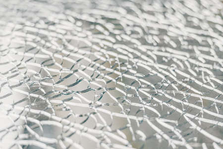 Close-up of broken glass. Abstract background. Selective focus.の写真素材