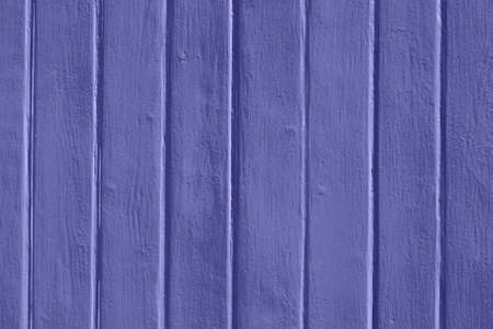 Texture of painted wooden wall background very peri color.の写真素材